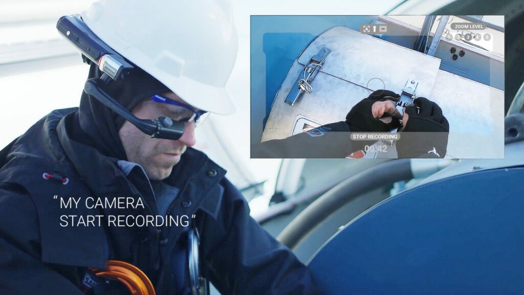 technician using realwear assisted reality device