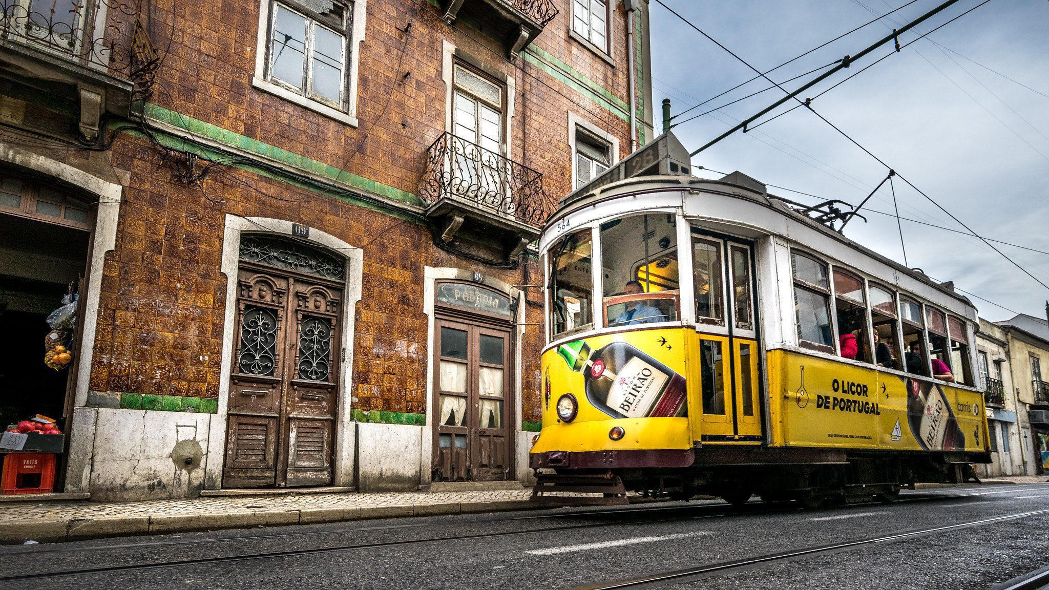 Lisbon's tram line number 28 passing the street