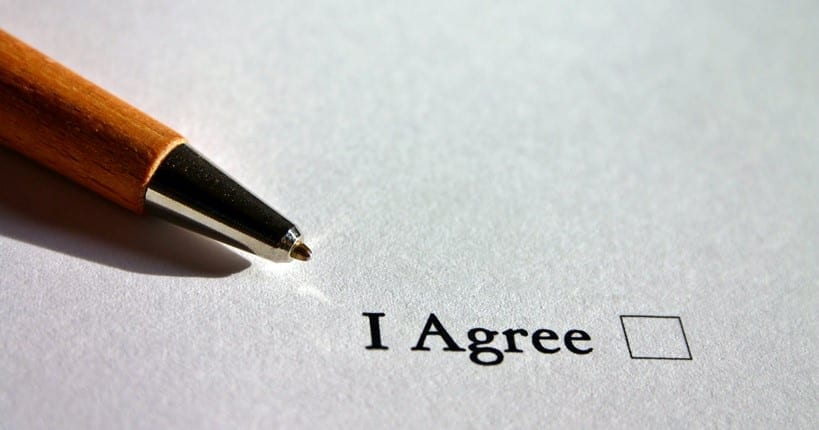 Pen placed on a sheet of paper with